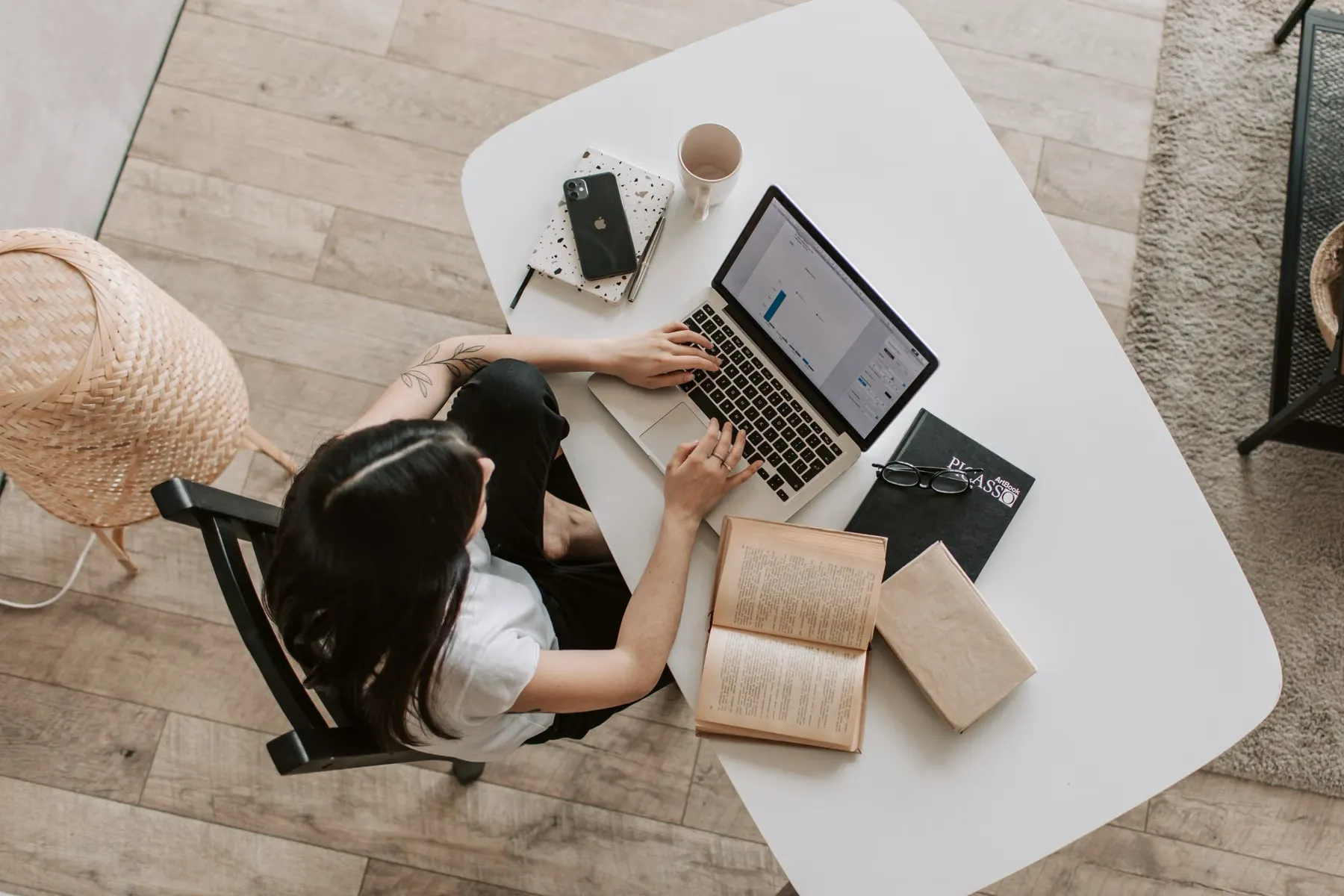 Workplace desk with laptop, reports, and clear closing coordination